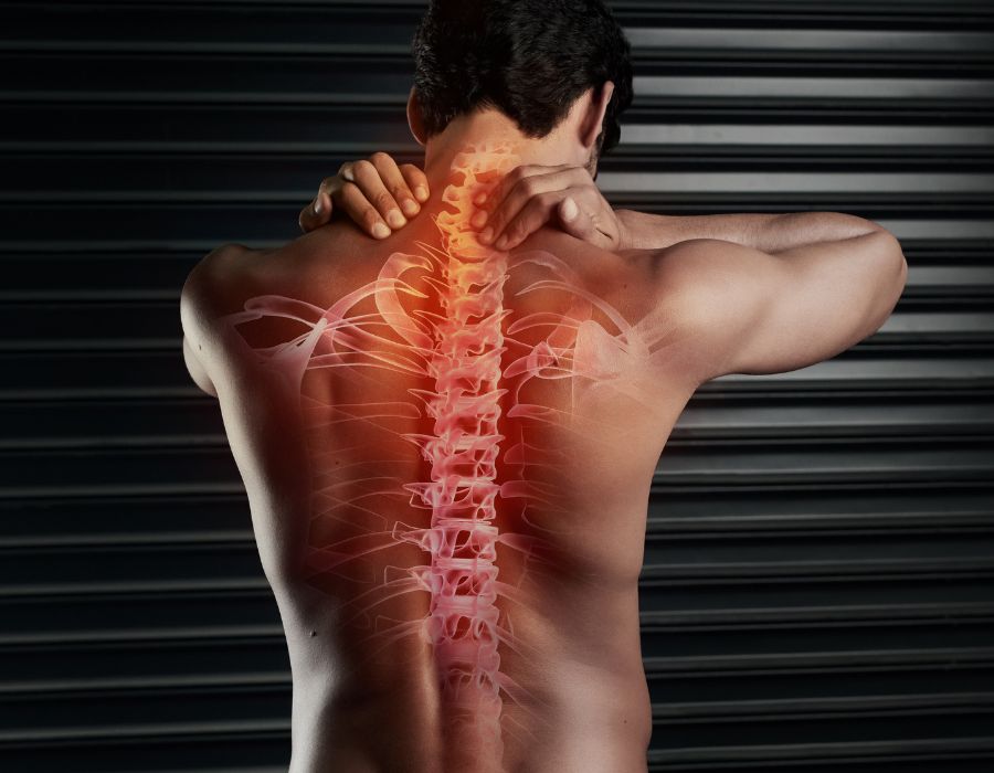 man suffering pain from a spinal cord injury