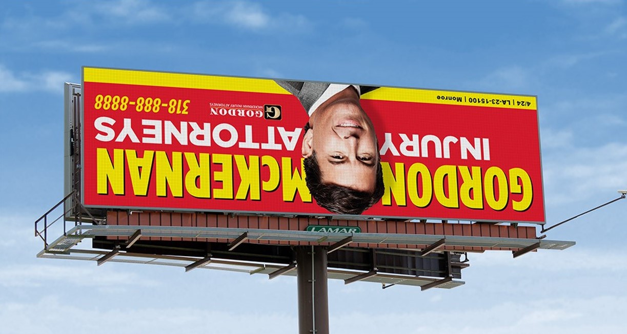 Gordon McKernan Flips Billboards Upside Down for April Fools' Fun - Get ...